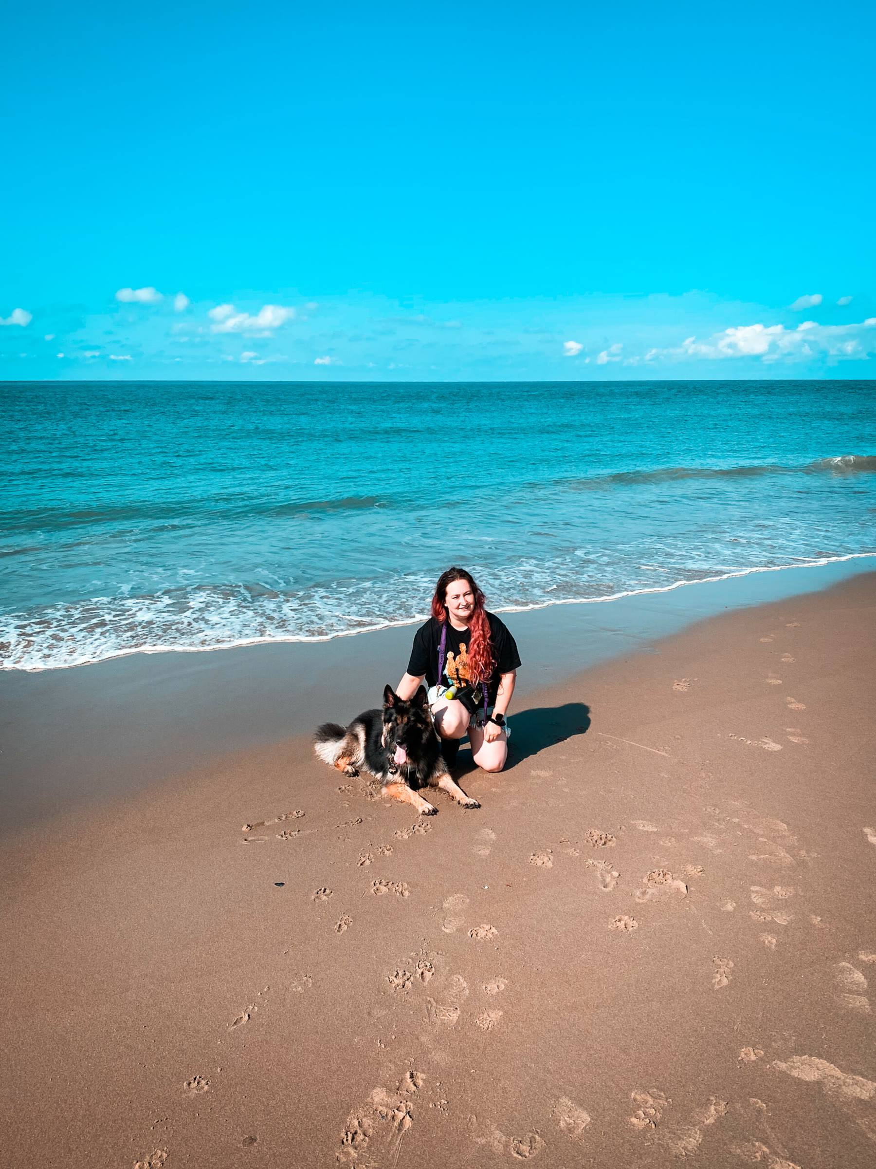 Melissa and Arya on a sunny beach
